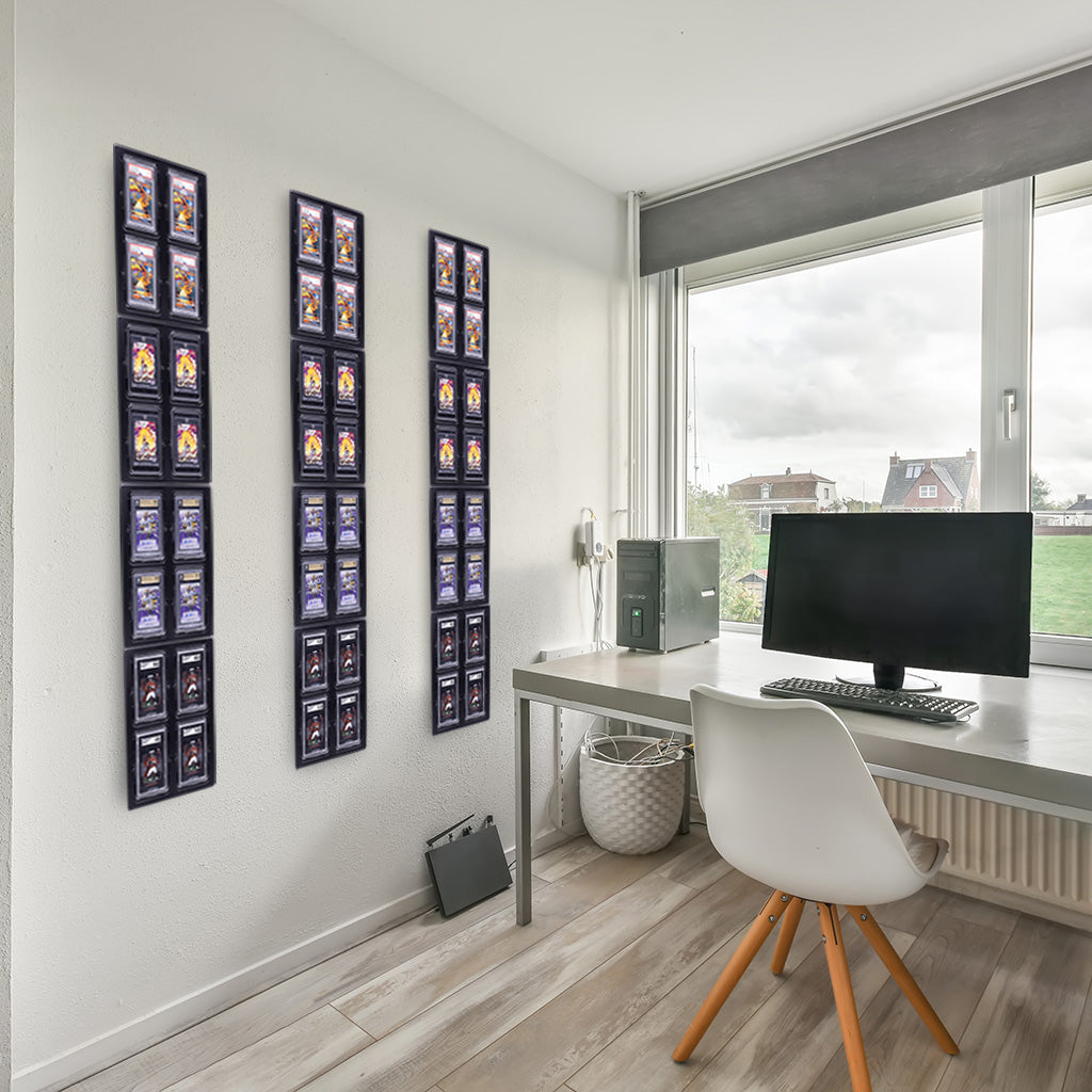 A display in a living room showing 48 trading cards: 12 each in PSA, magnetic, SGC, and Beckett card holders. The holders are arranged neatly, showcasing the artwork and condition of the cards. The living space is cozy, blending hobby with home décor.